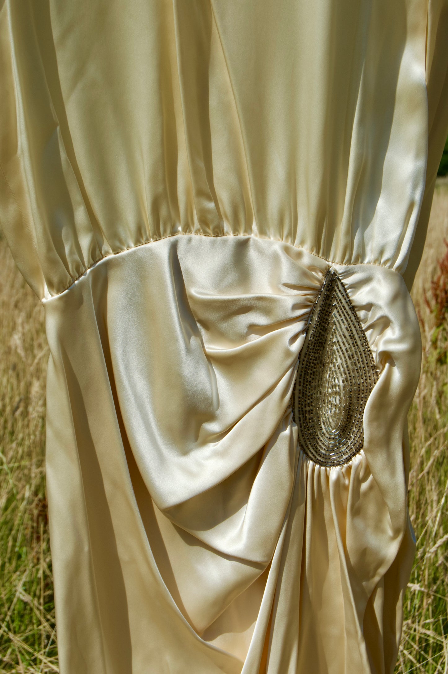 Embellished ivory dress