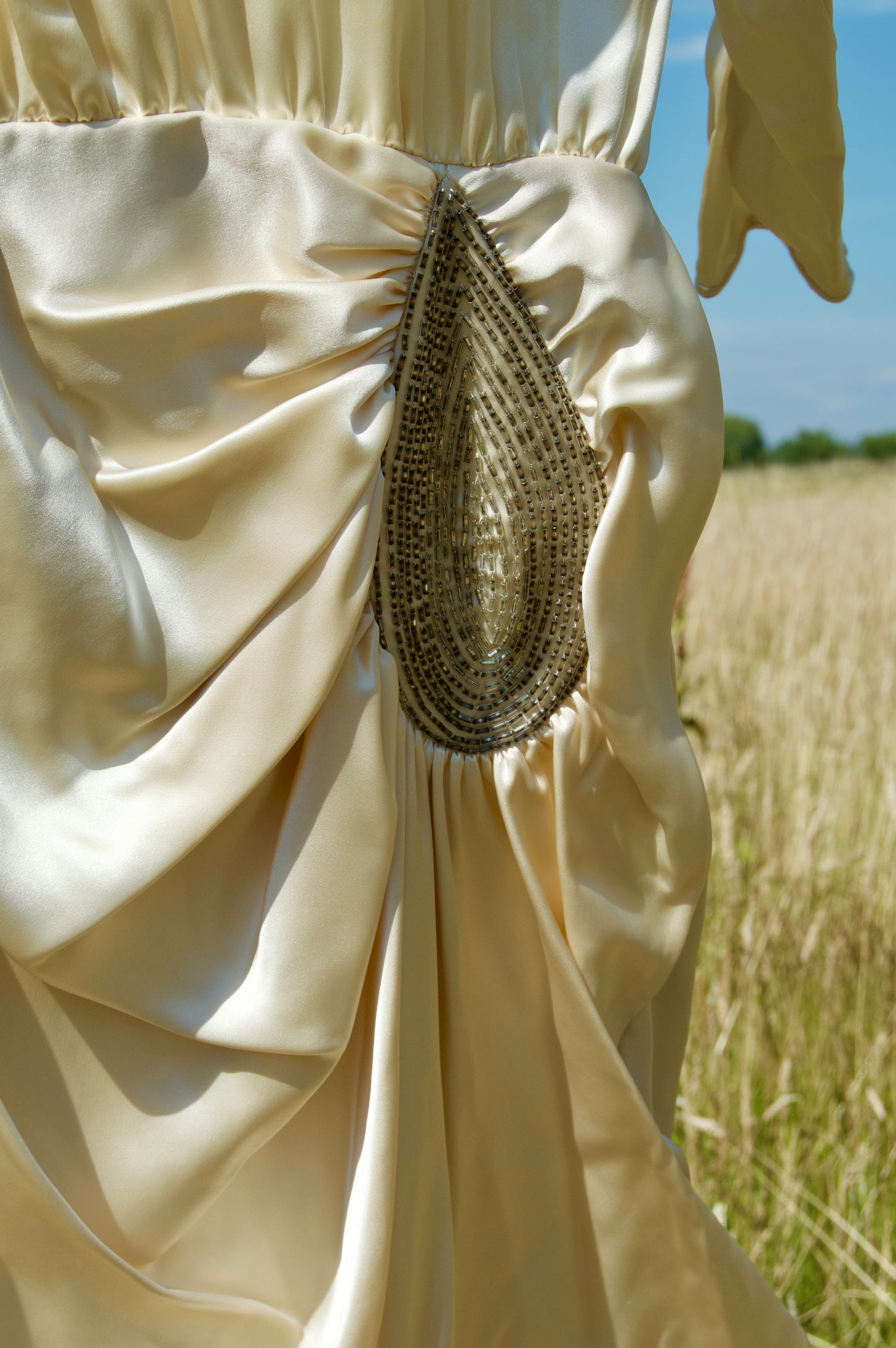 Embellished ivory dress