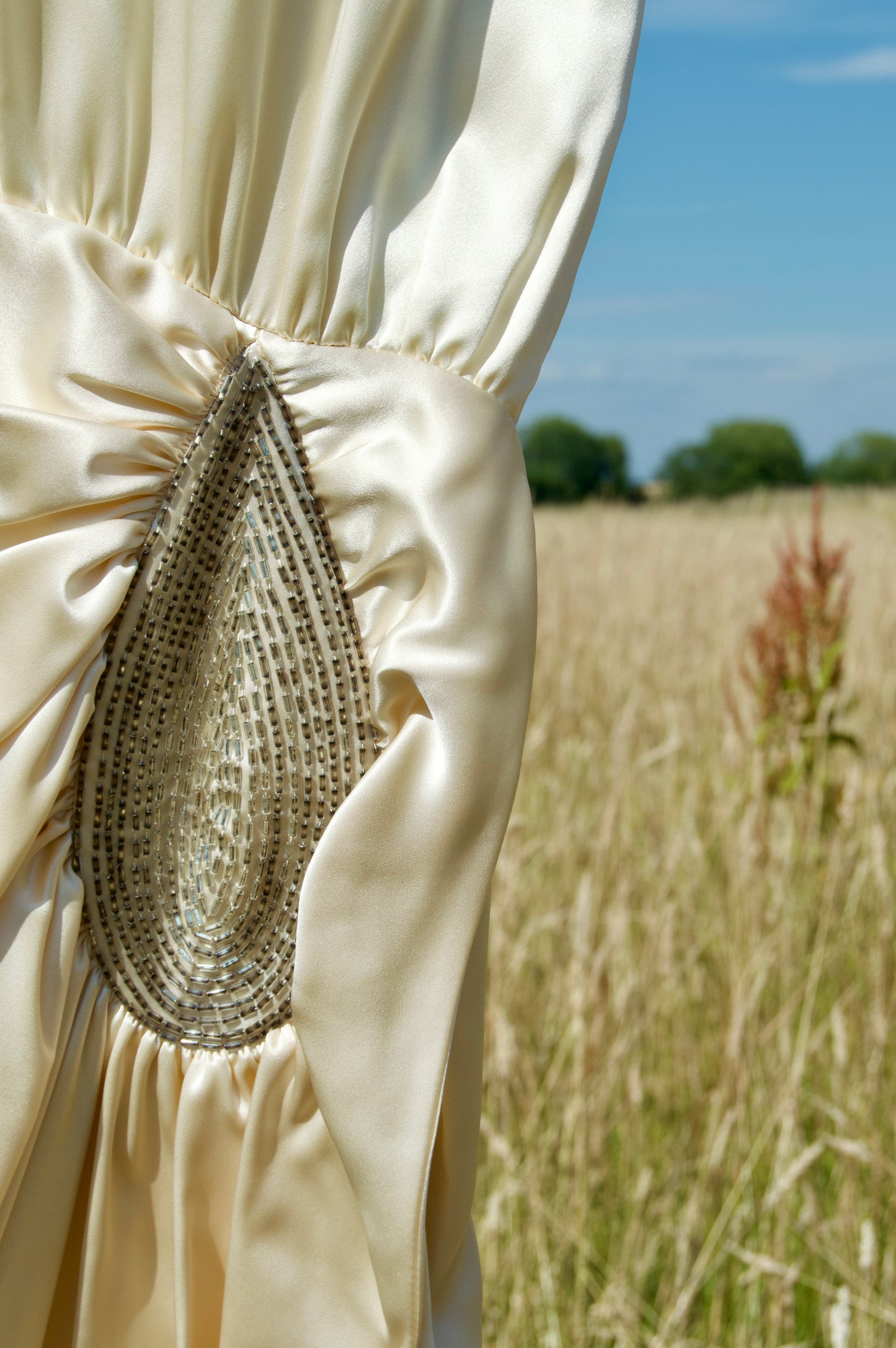 Embellished ivory dress